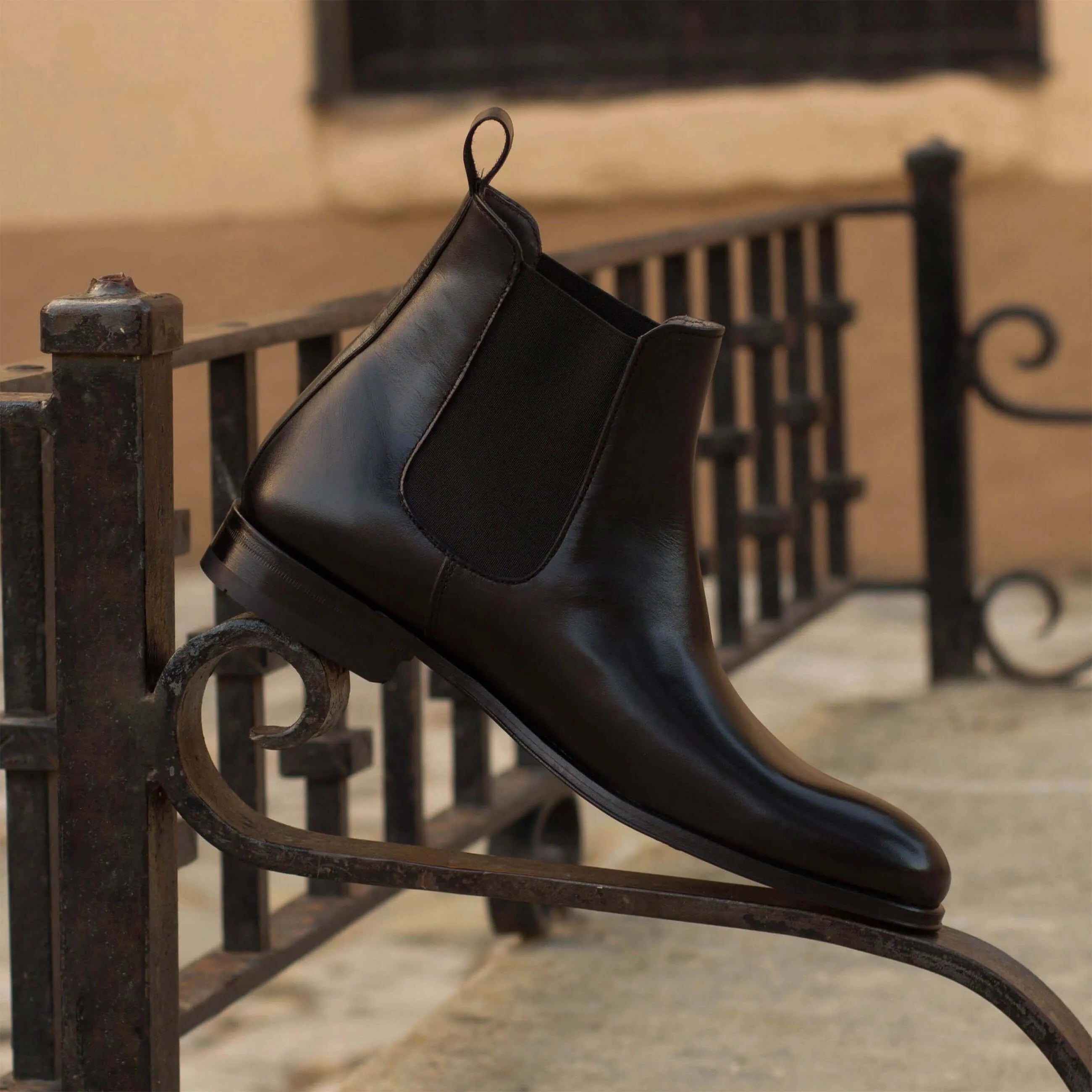 Black Chumani Chelsea boots in leather, back view