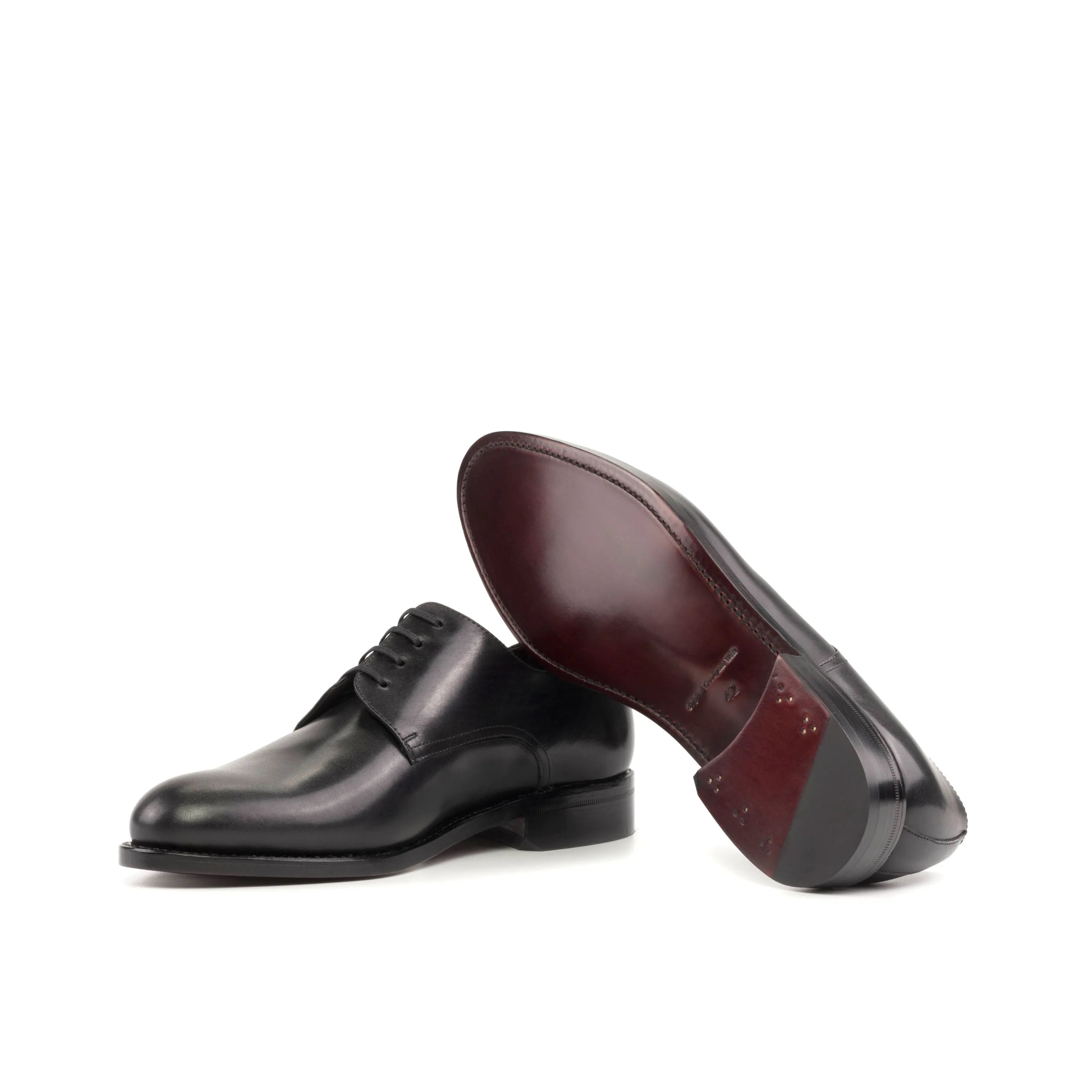 Pair of black leather Edanos Derby shoes in fast lane style