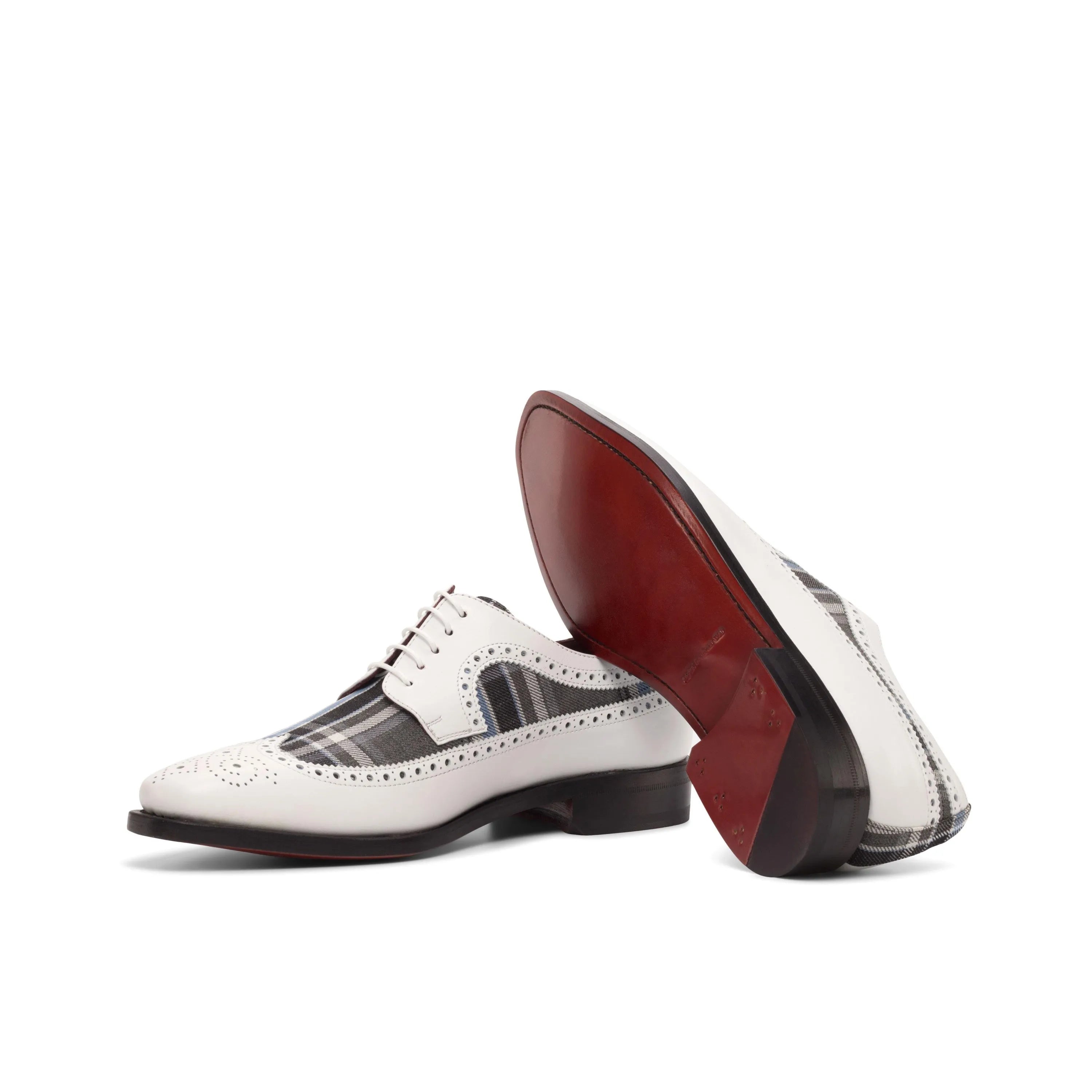 Jazzy longwing blucher shoes in white and plaid wingtip design