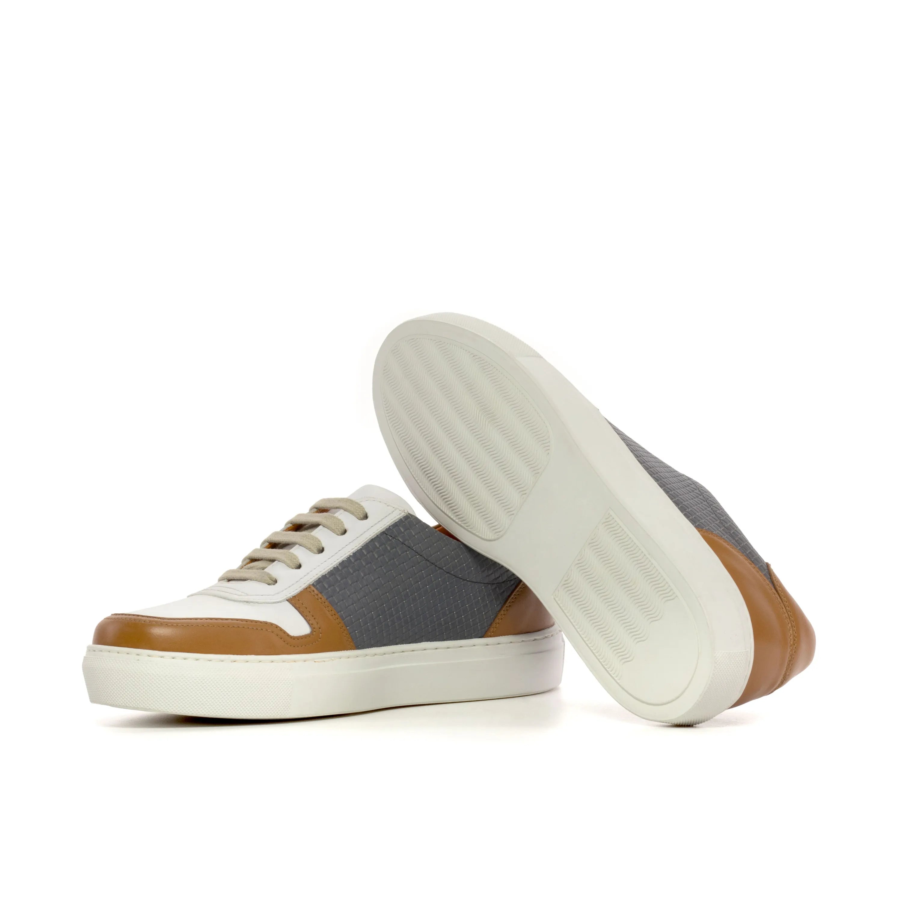 JiJi unisex trainer sneaker with two-tone leather and cupsole design