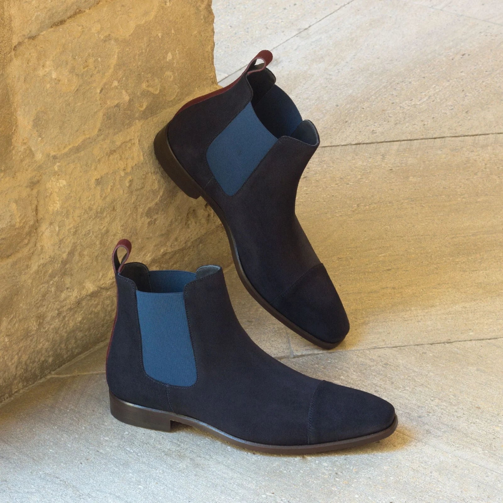 Musko navy suede Chelsea boots with navy elastic panels and red pull tab