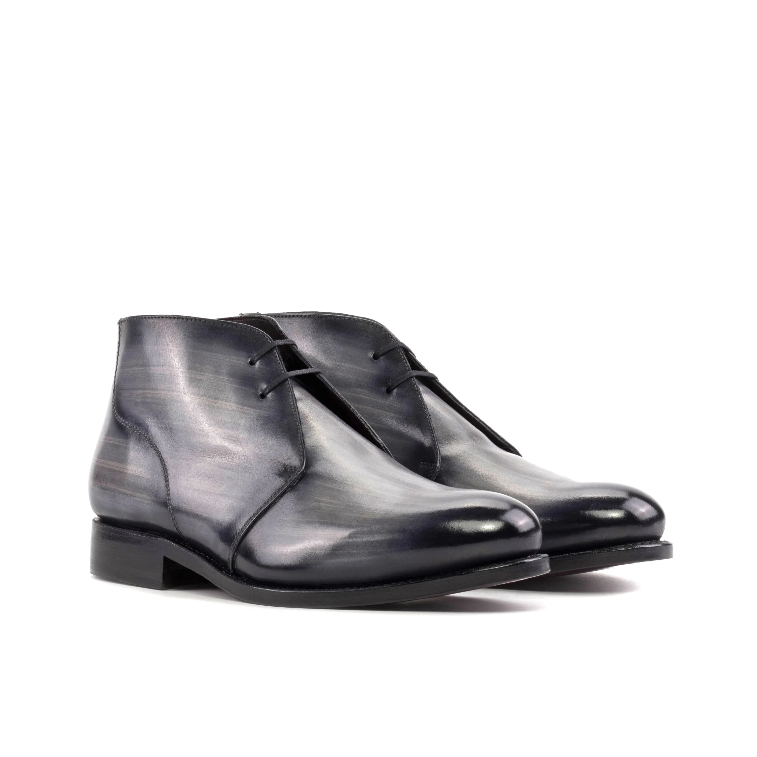 Othello patina chukka boots: pair of gray leather chukkas