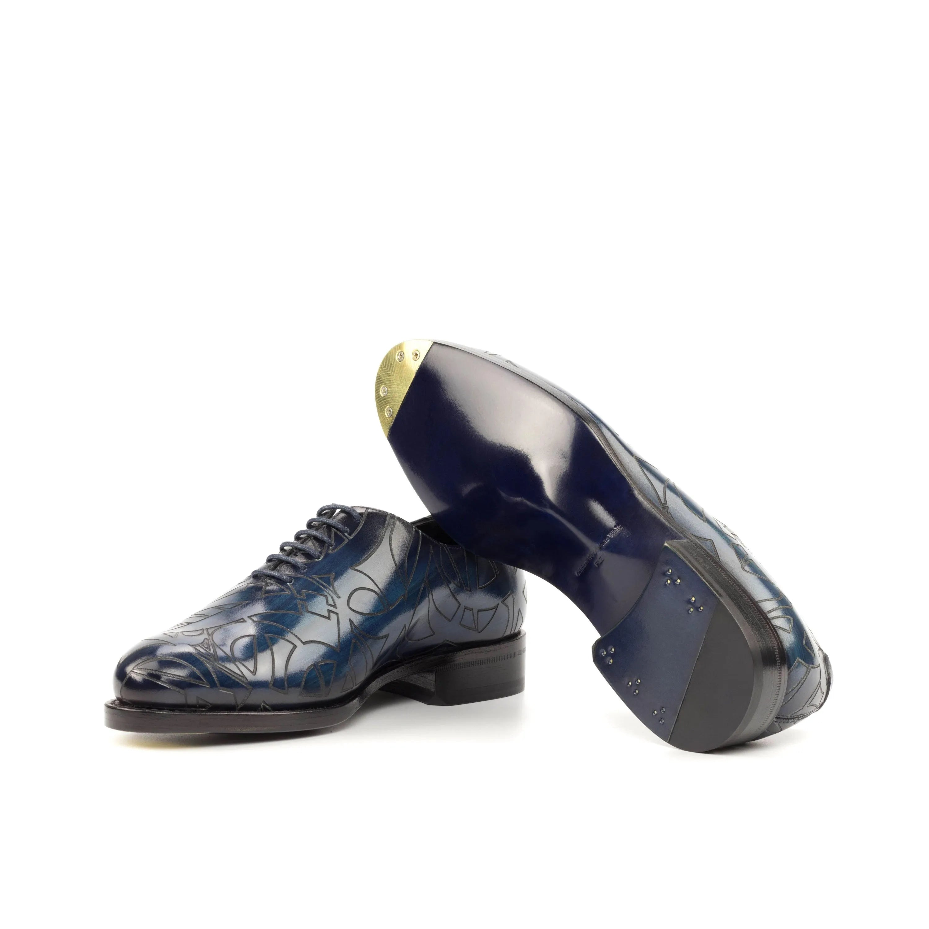Pair of blue patina wholecut Quswa 2 shoes in Italian crust leather