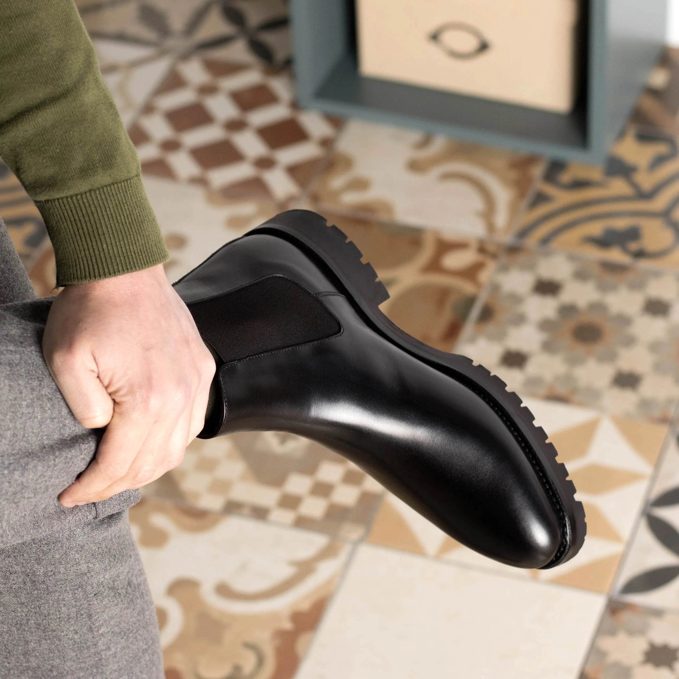 Black leather Solitude Chelsea Boots back view