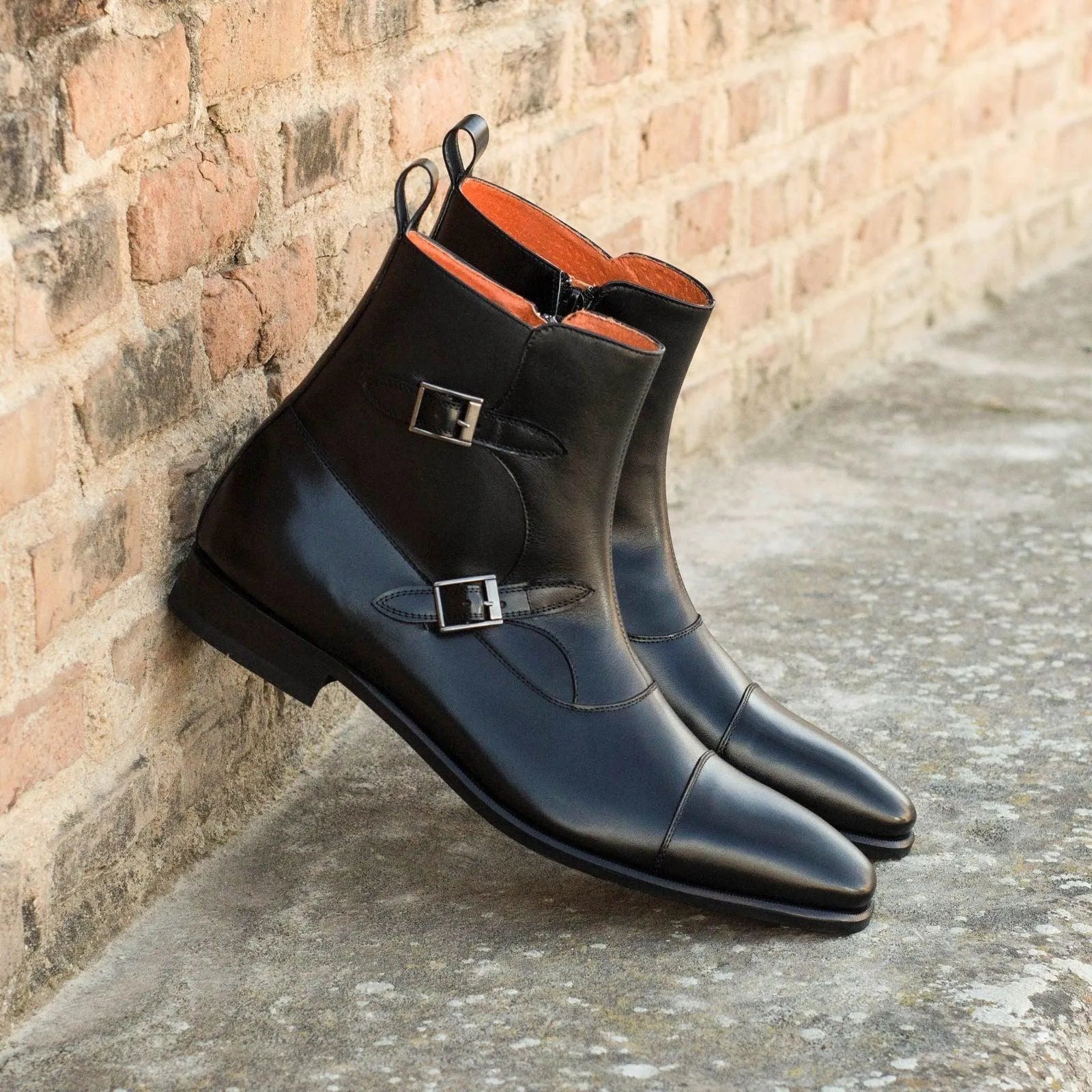 Pair of black leather T90 Octavian Boots II monk strap boots