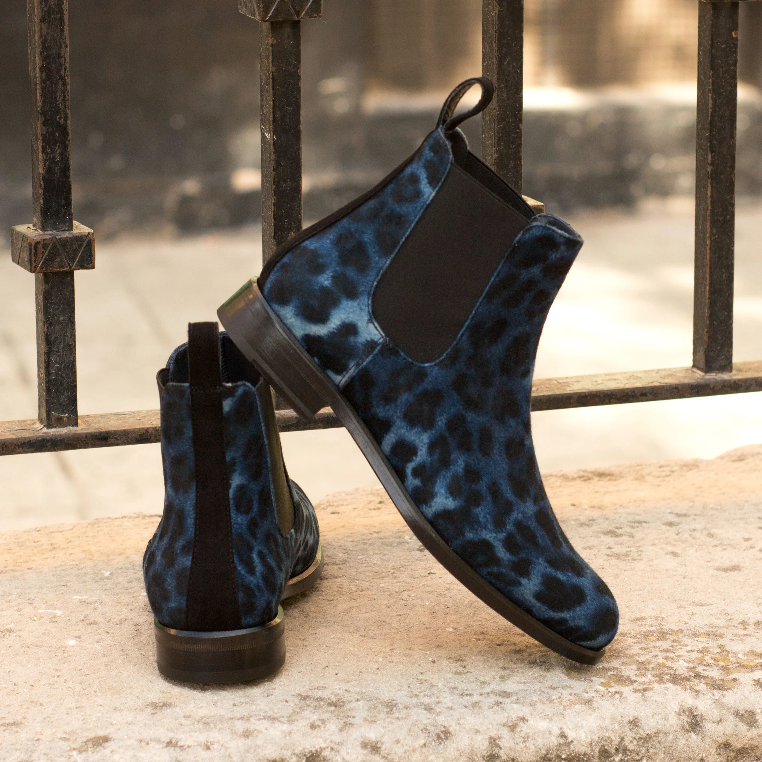 Youla ladies Chelsea boots in blue leopard print with black elastic panels