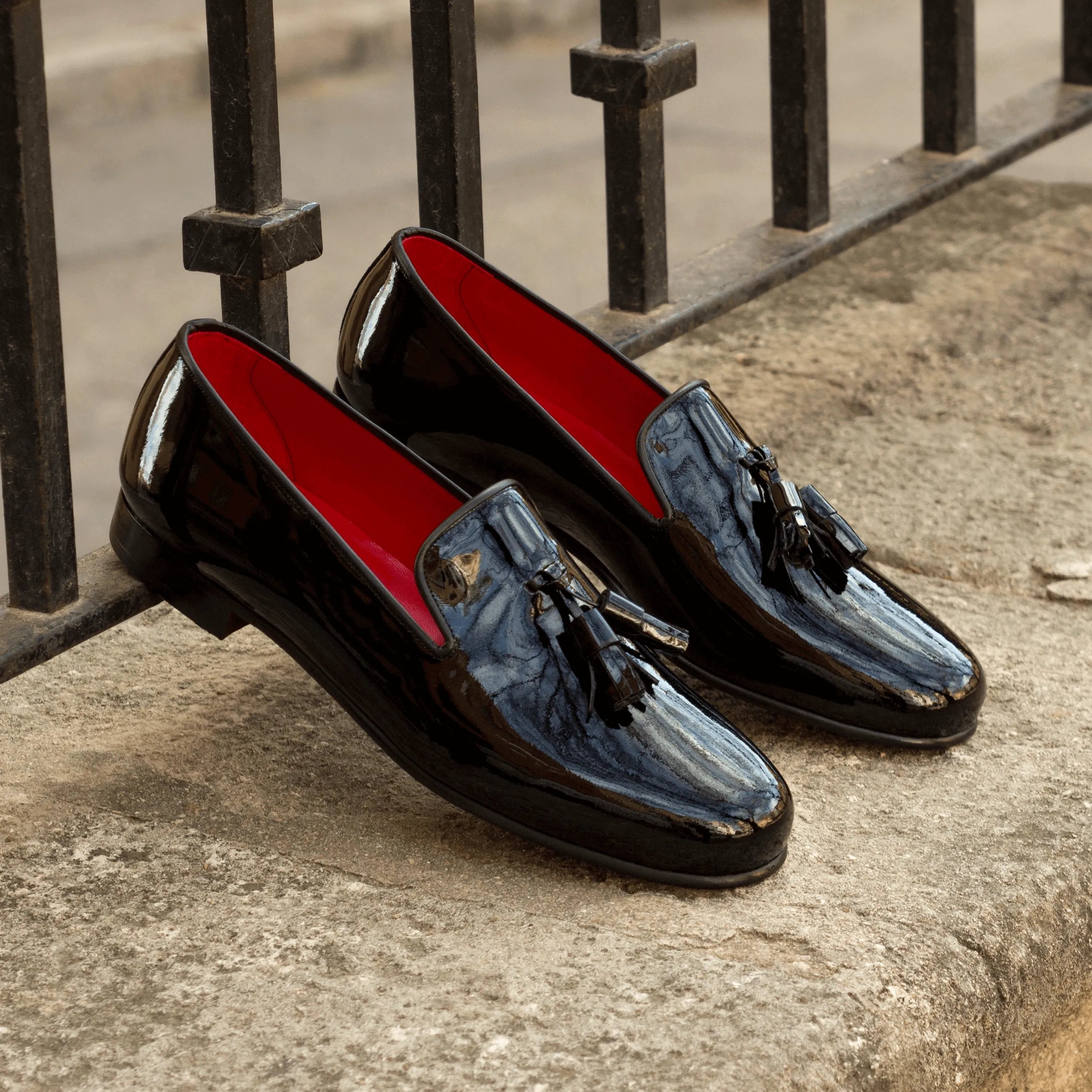 Shiny black tassel loafers on Amuso Wellington slip on II