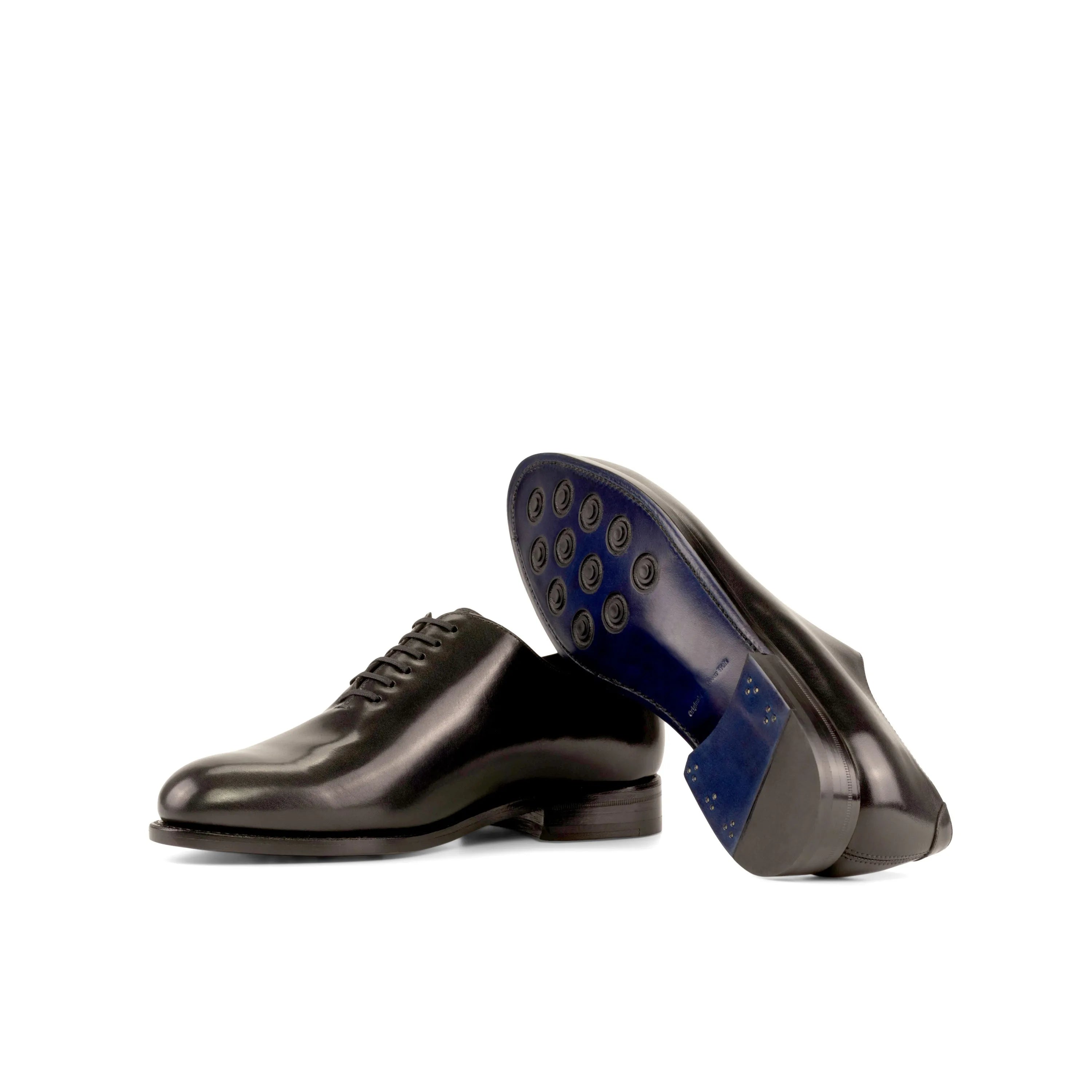 Hans Wholecut shoes: pair of shiny black leather dress shoes