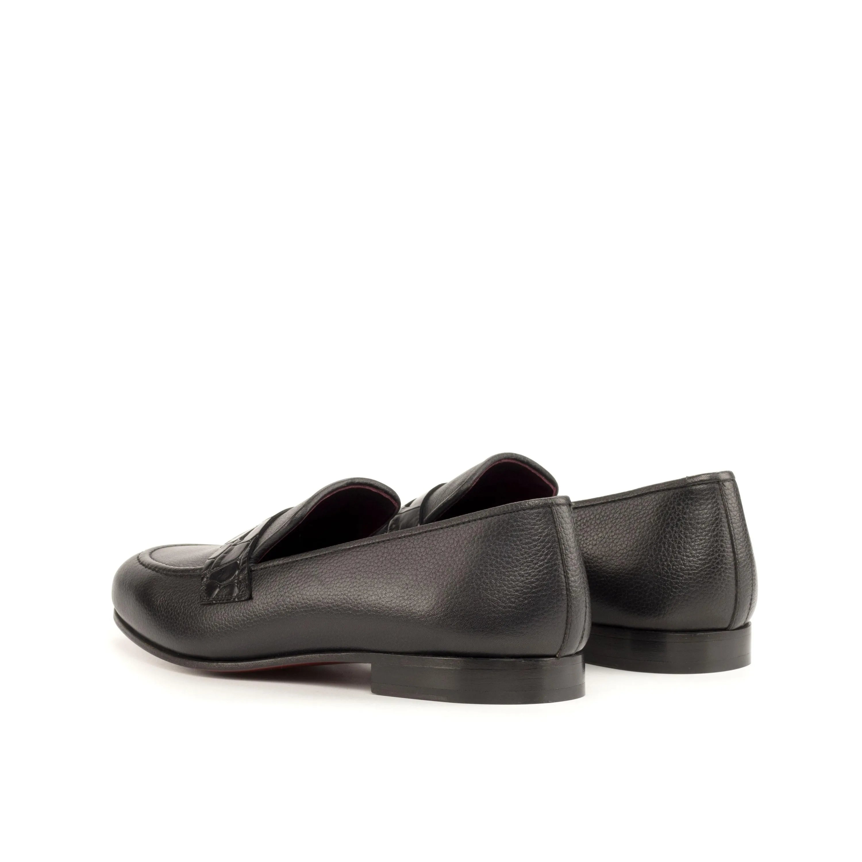 Pair of black leather penny Patron Wellington Slip loafers