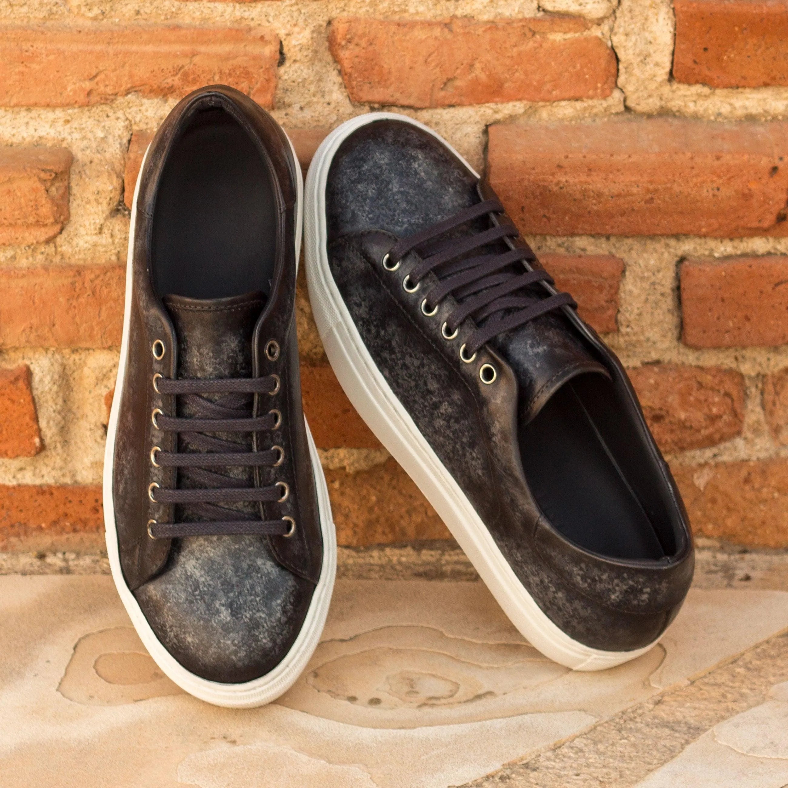 Pair of black leather Sancho Trainer Patina Sneaker II