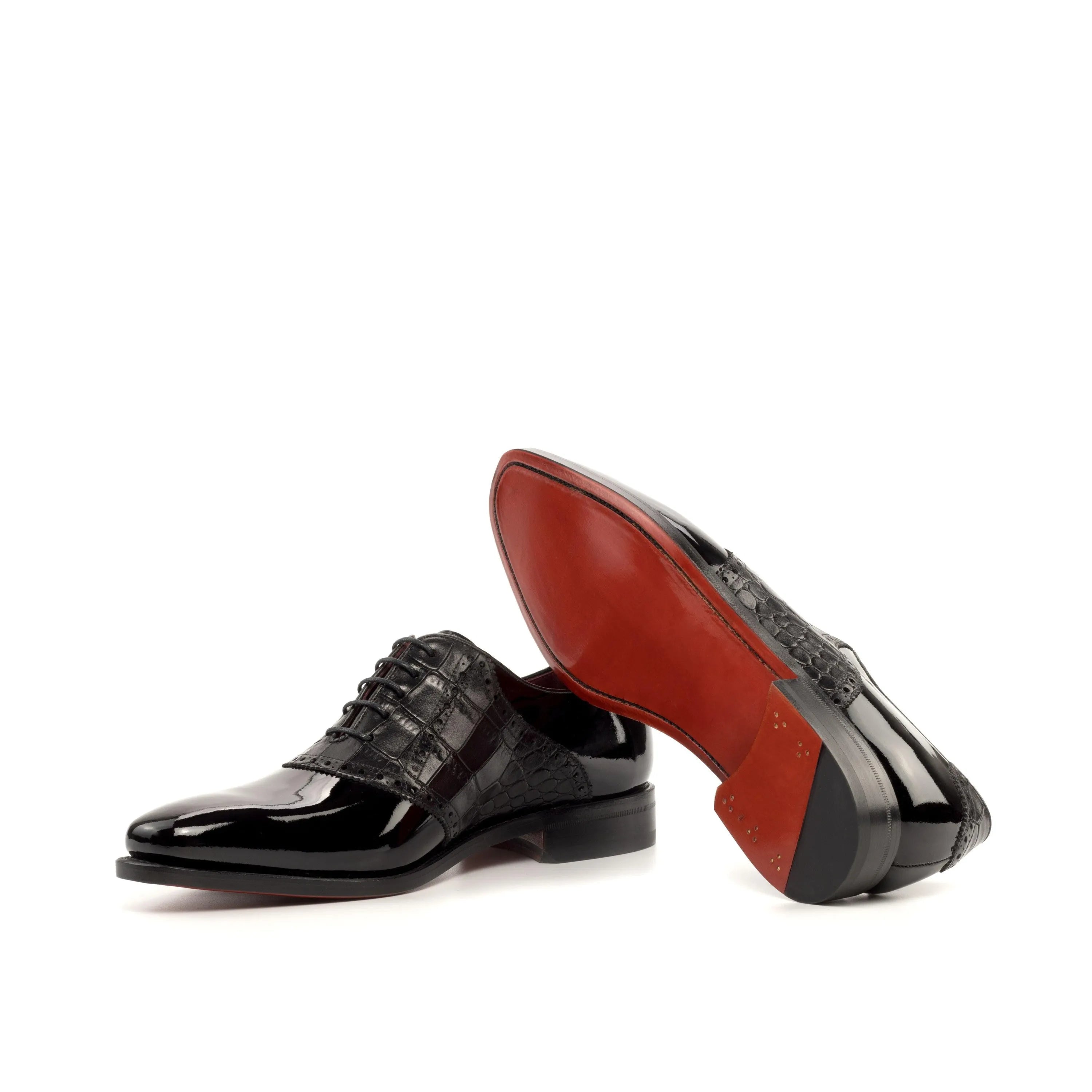 Sorgino saddle shoes: black patent leather with red soles