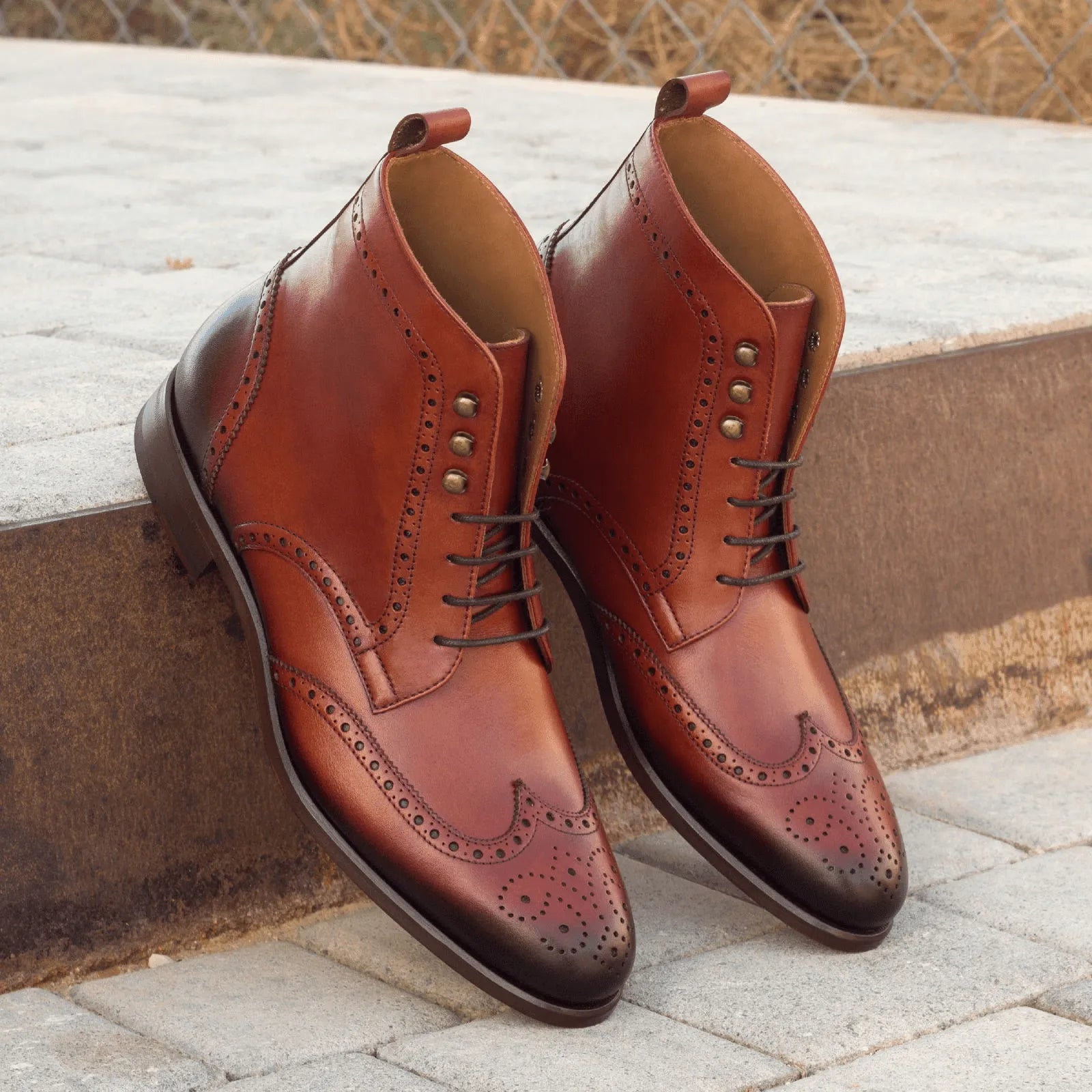 Timon Military Brogue Boots II pair of brown leather wingtip boots