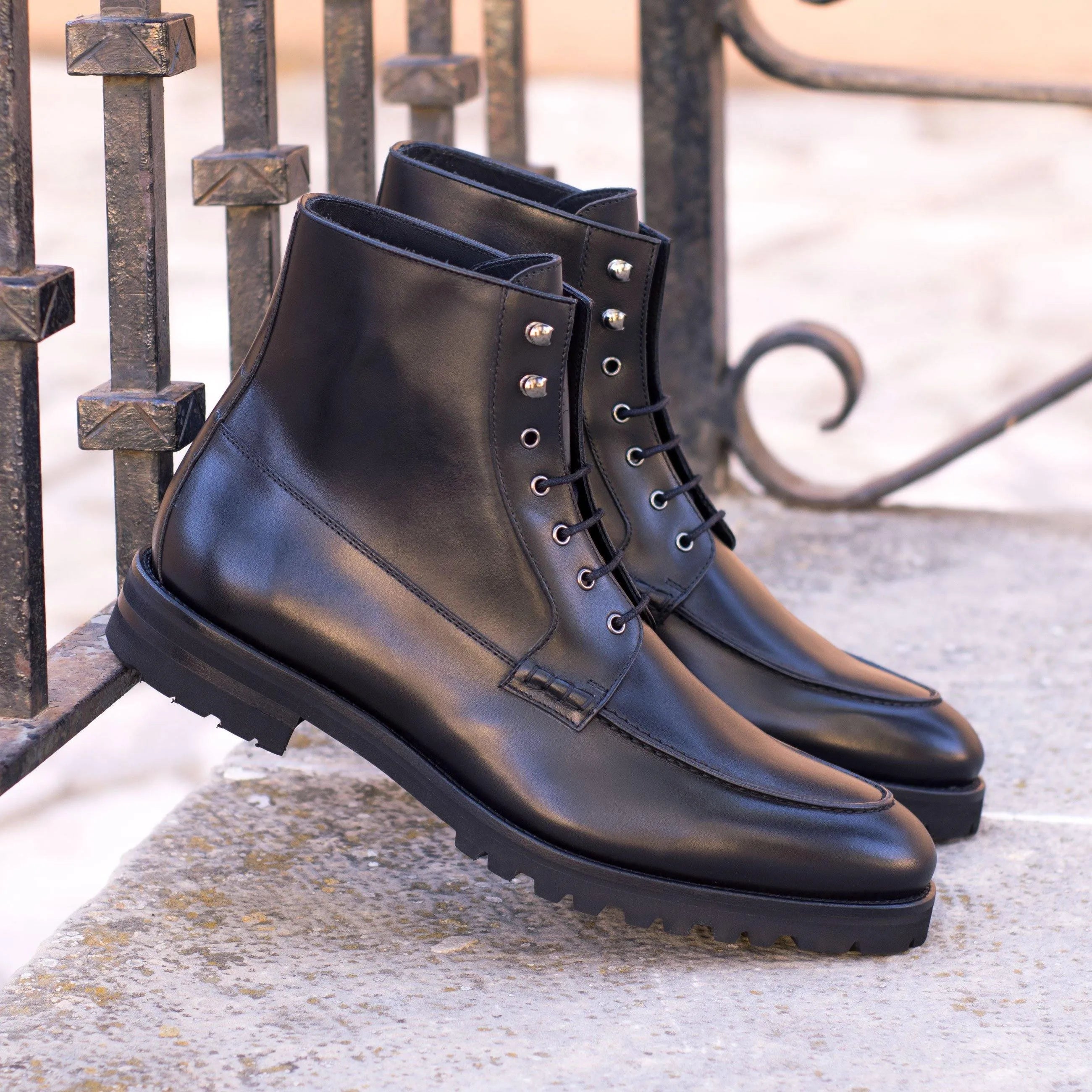 Black Wisconsin Moc Boots with leather lace-up back view